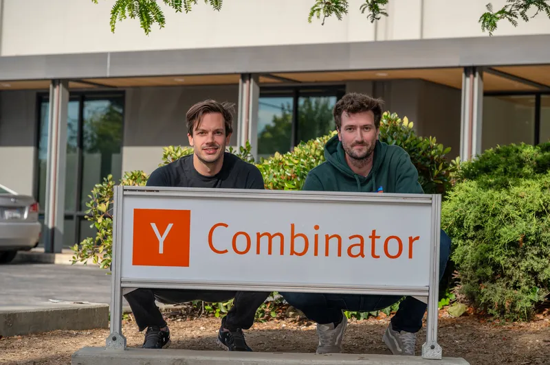 Ben and Nick at the YC sign in 2023